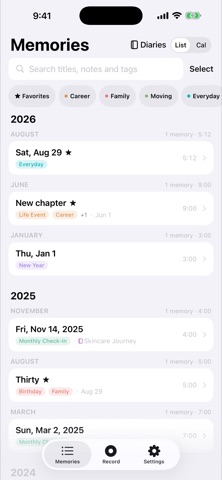 XUsMemories library listing memories by year and month, with tag filter chips and colored tags